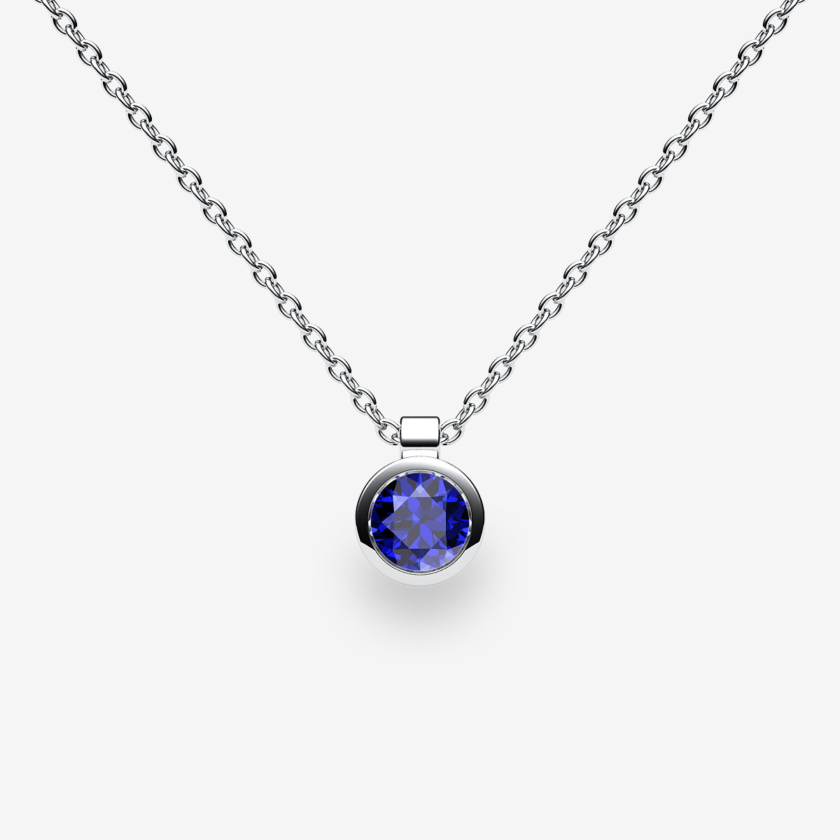 Platinum 950‰ Blue Sapphire bezel set pendant