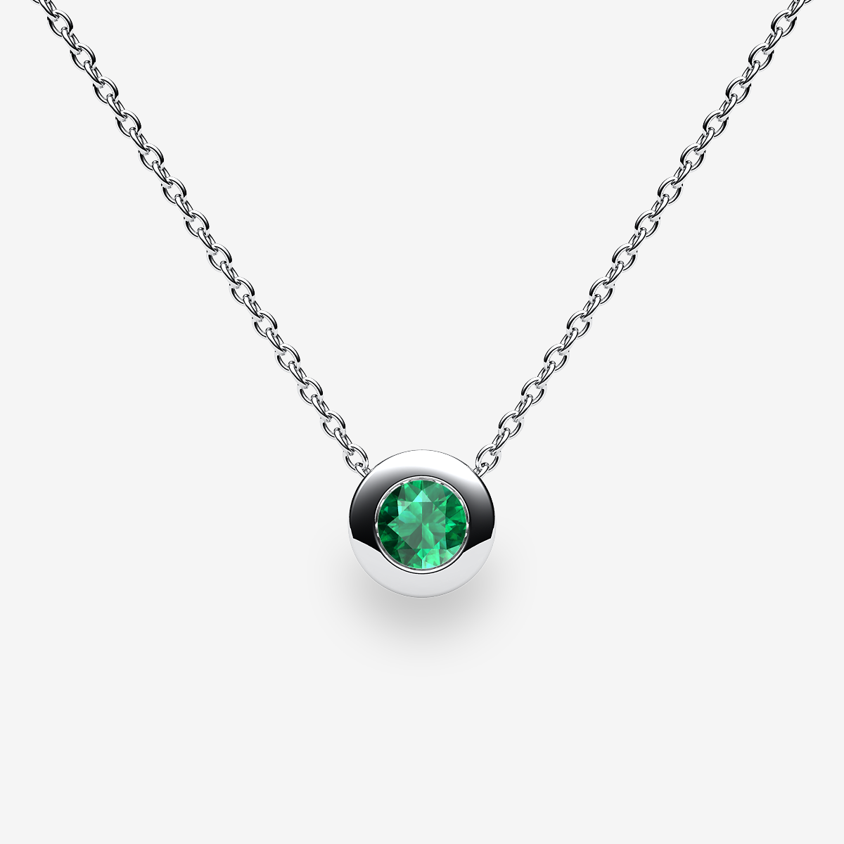 Platinum 950‰ Emerald bezel set pendant