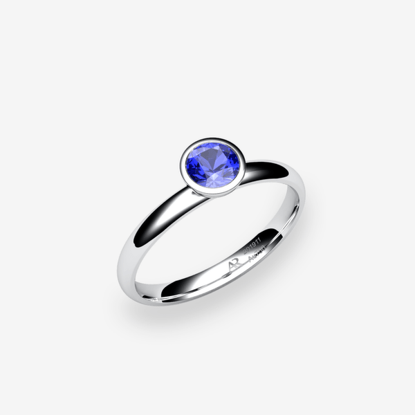 Melody Platinum 950‰ Blue Sapphire bezel set engagement ring