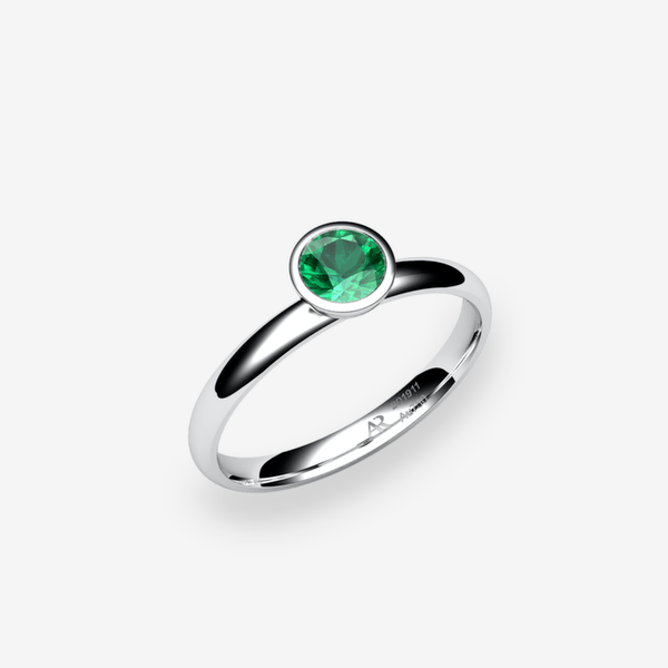 Melody Platinum 950‰ Emerald bezel set engagement ring
